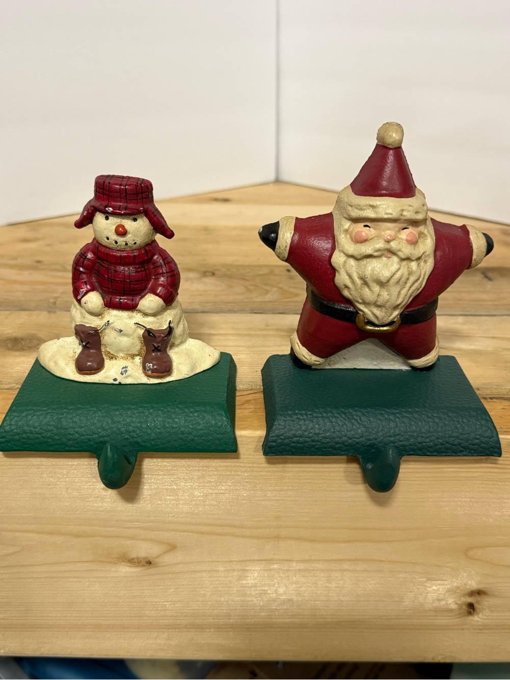 Vintage 1998 Eddie Bauer Cast Iron Stocking Hangers Pair Santa Snowman Preowned